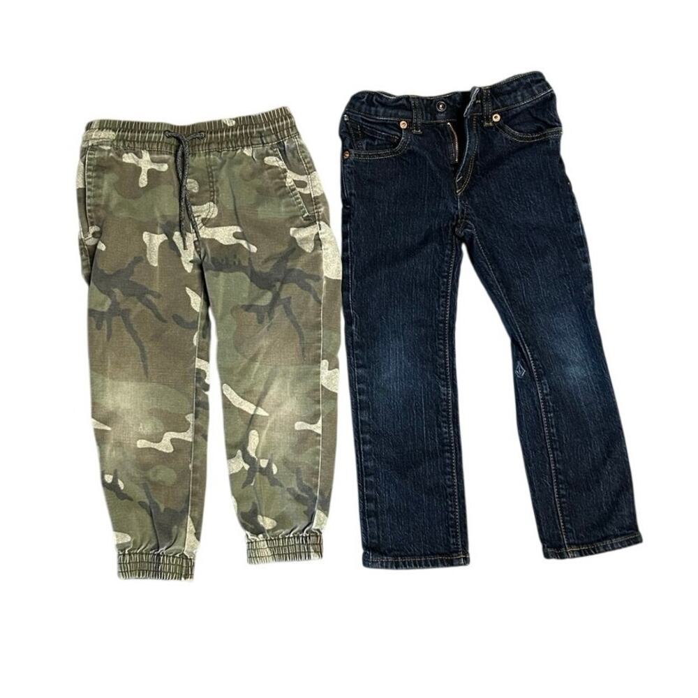 Set of two boys size 5 Volcom slim straight denim jeans and green camo joggers